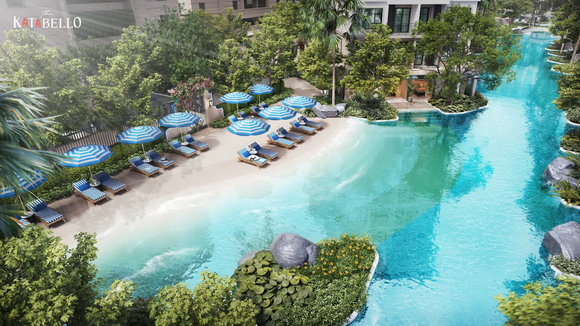 The Sunset Beach from above: blue and white parasols along a long turquoise lagoon